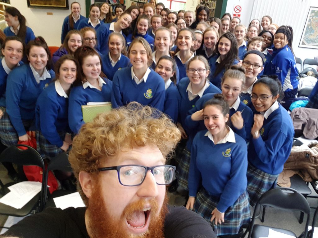 Photo of Dave with a writing class
