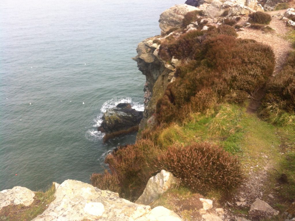 Photo of a cliff edge over the Irish sea